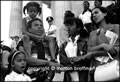 Andrew Young and family on the steps of the Lincoln Memorial.  Poor People's Campaign, 1968.